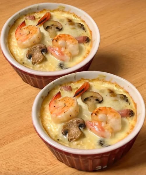 Zeevruchtenschotel: Sint-jakobsschelpen, champignons en garnalen