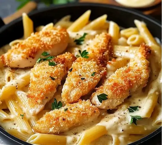 Krokante kippenne met Parmezaanse kaas en romige saus